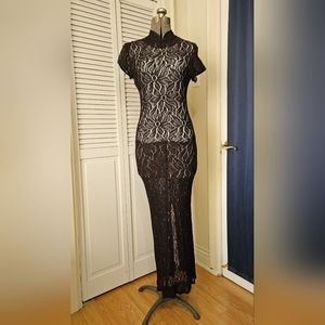 Full-length see-through high-collar lace dress with underdress